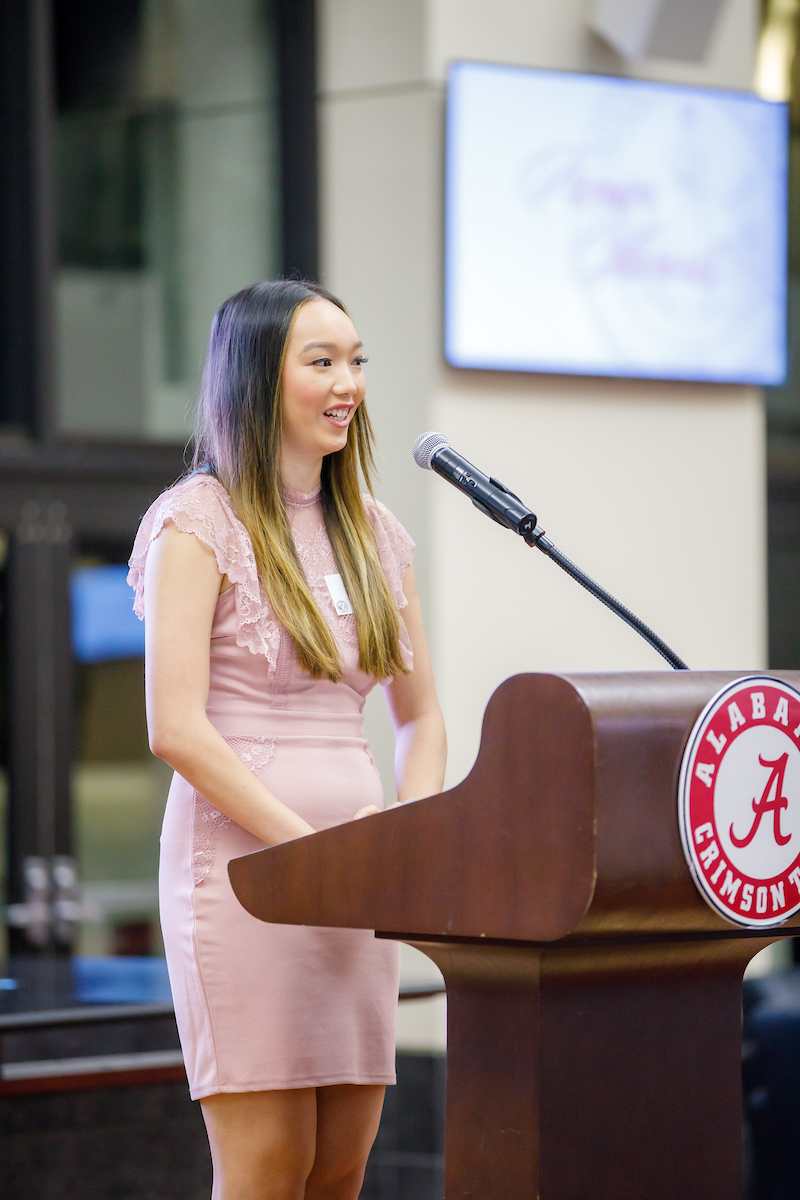 Student speaks at an awards ceremony